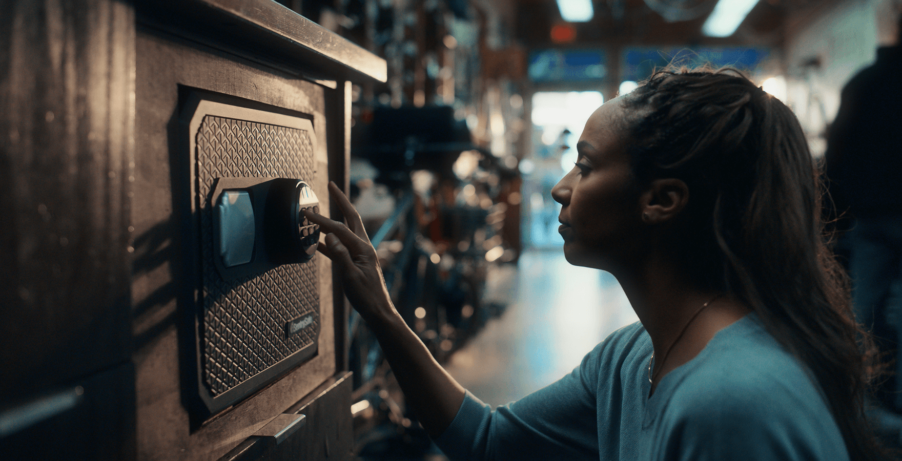 Master Lock Woman Unlocking Safe